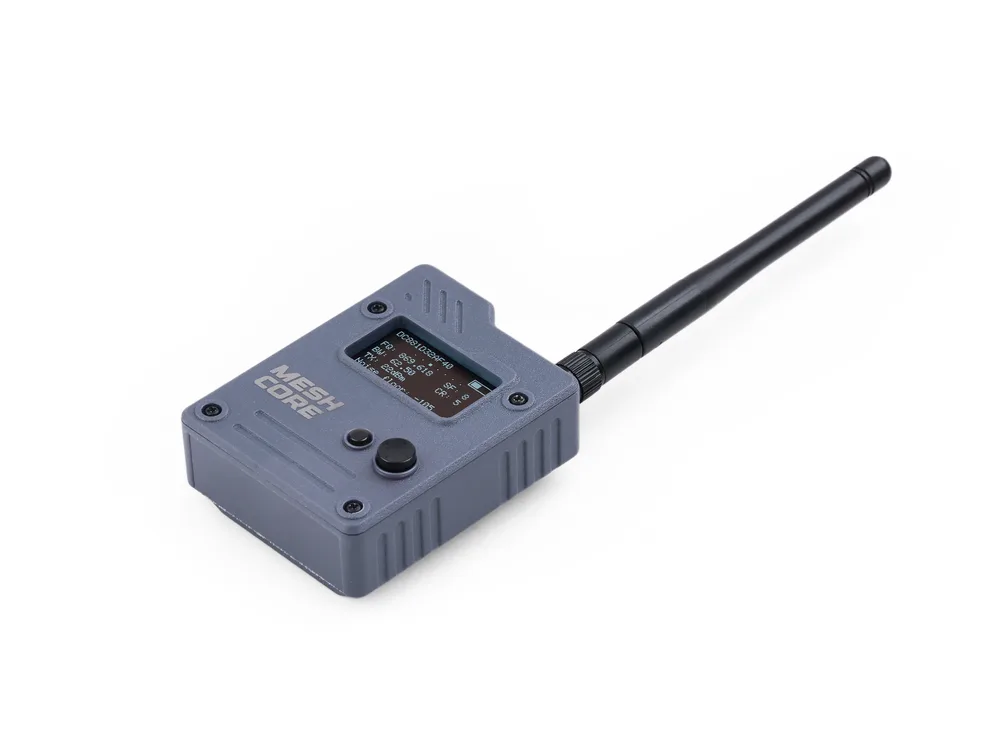 Wio Tracker L1 Pro: a small grey pod with a screen, one button and an antenna