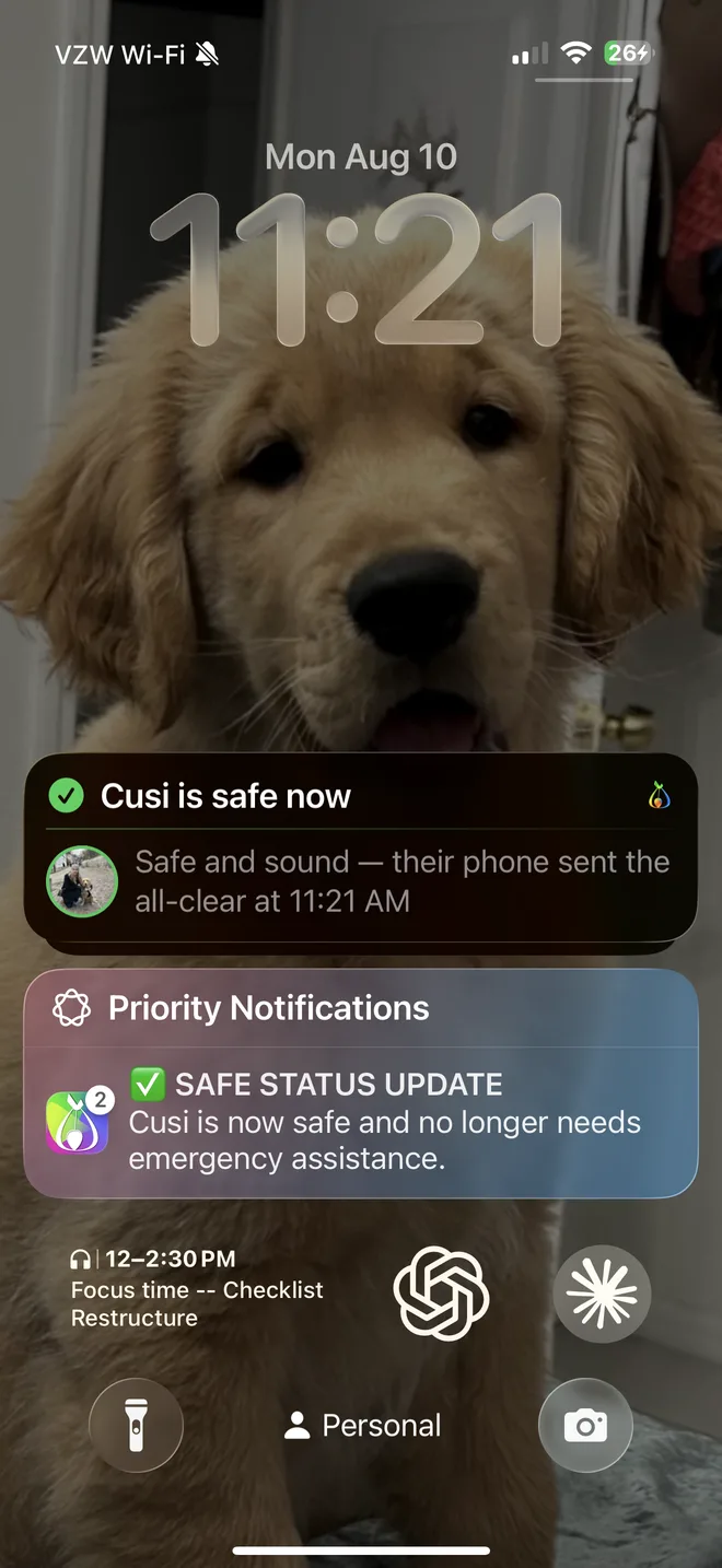 The all-clear on a real lock screen — “Cusi is safe now: safe and sound, their phone sent the all-clear”